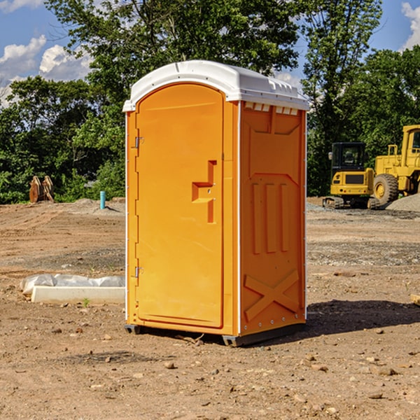 what is the cost difference between standard and deluxe portable toilet rentals in Buffington